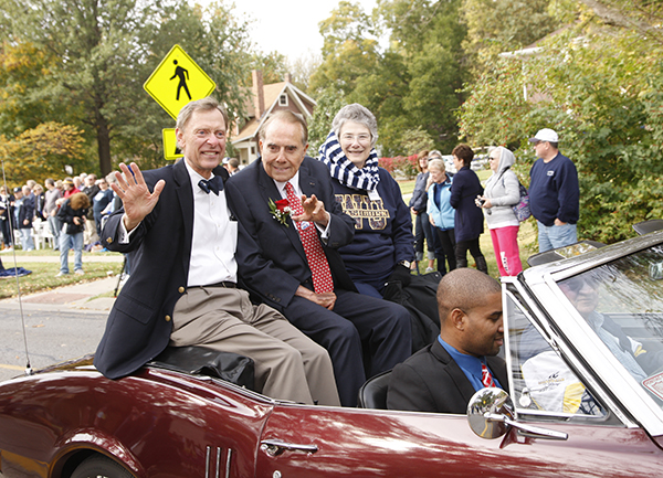 Bob Dole with Jerry and Susan Farley in the Homecoming parade