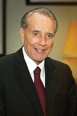 Posed photo of Bob Dole in a suit and tie