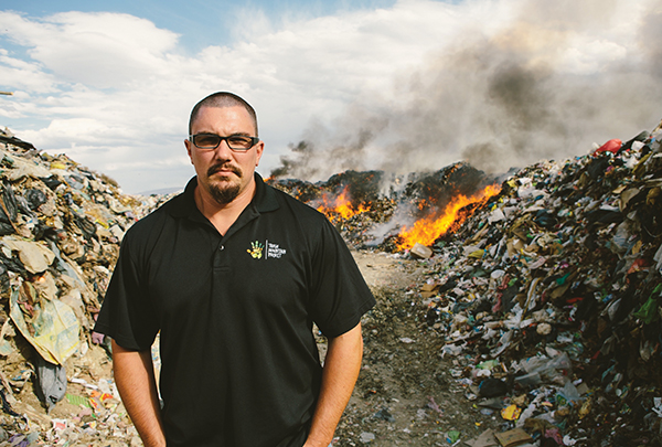 Brett Durbin in a trash mountain community