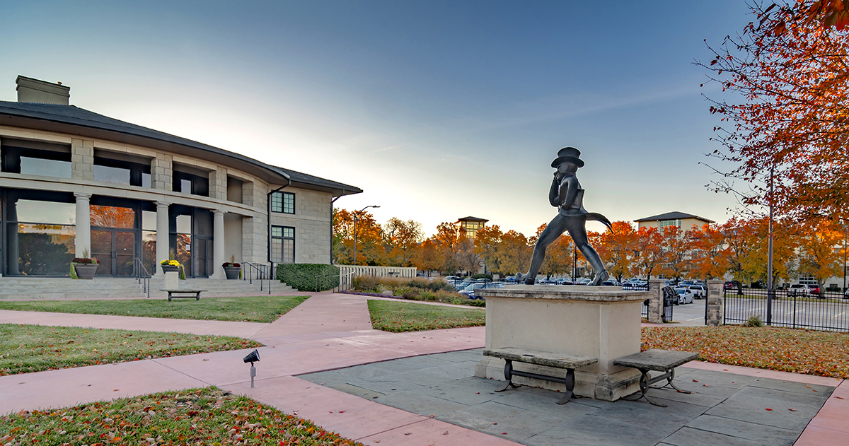 The Ichabod statue on the back patio of Bradbury Thompson Alumni Center during the fall