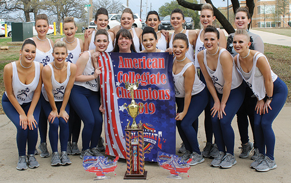 The Dancing Blues with their 2019 national championship trophy