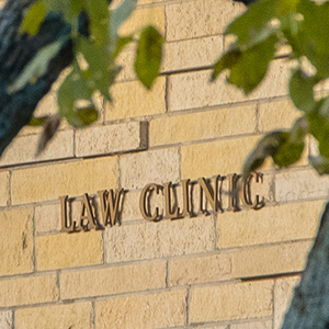 Law Clinic sign outside building